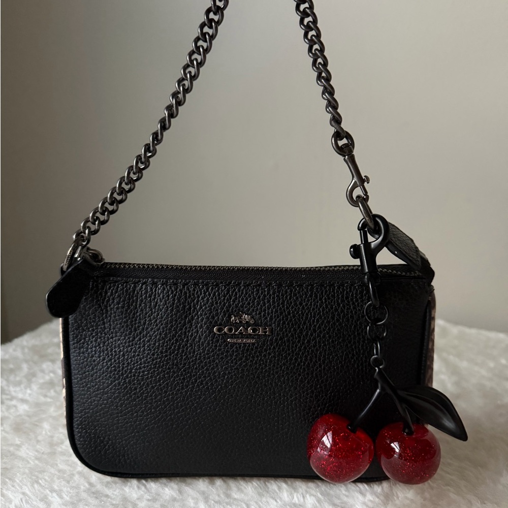 Coach Nolita 19 bag black leather and snake embossed leather with cherry charm